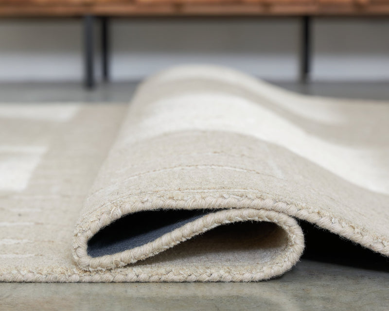 Wolbert 5' x 7' Area Rug - Town Of Bargains Furniture - NY